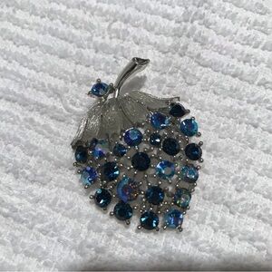 Silver and Blue Gem Brooch shaped like a strawberry.